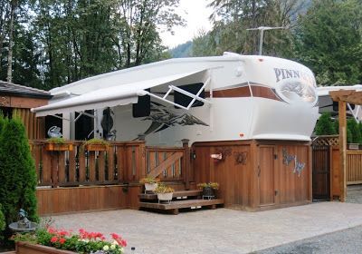 deck ideas camper stained wrapped deck Deck Ideas For Campers, Porch For Camper, Rv Skirting, Campsite Decorating, Trailer Deck, Rv Lots, Architecture Renovation, Diy Camper Remodel, Rv Homes