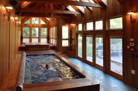 With its Original Endless Pool®, this sunroom offers a safe, rustic environment for a brisk swim on an autumn day. Indoor Swim Spa, Swimming Pool Cost, Endless Pools, Indoor Swimming Pool Design, Pool Indoor, Indoor Hot Tub, Pool Cost, Indoor Pool Design, Endless Pool