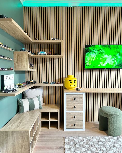 Makeover Monday || Jack’s Bedroom >>> Swipe for before The time has finally come to reveal Part 1 of Jack’s Bedroom Makeover! 💚 The brief from Master J was fairly simple… ✔️ Everything green ✔️ TV & Playstation ✔️ Somewhere to display Lego Of course my priority is always storage but I knew @flexistorage would have me covered so no stress there! Our famous @flexistorage desk from last year’s bedroom makeover has made a return with some moody new handles to elevate the look. I was dete... Ledge Headboard, Bedroom Wall Panelling, Lego Shelves, Water Damaged Ceiling, Everything Green, Wall Ledge, Decorative Shelves, Bedside Drawers, Round Ceiling Light