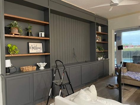 Dark Grey Built Ins Living Room, Dark Grey Basement, Urbane Bronze Built Ins, Tv And Bookshelf Wall, Built In Tv Wall Unit Dark Wood, Dark Grey Tv Unit, Dark Gray Entertainment Center, Wall Units For Tv Entertainment Center Dark Wood, Family Room Cabinet