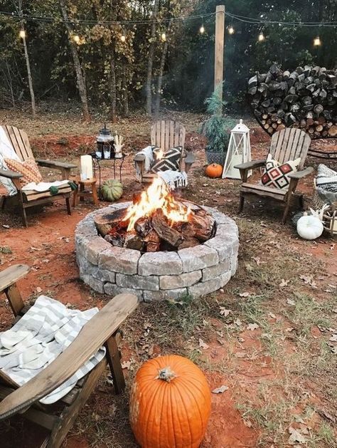 Crisp, cold autumn nights are perfect for spending time around a fire pit! Diy Fire Pit Area, Fire Pit Plans, Bonfire Pits, Outdoor Fire Pit Designs, Fire Pit Landscaping, Wood Holder, Patio Projects, Garden Fire Pit, Fire Pit Area