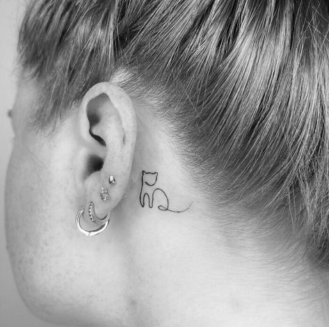 Single line cat tattoo near the ear Cat Ear Outline Tattoo, Cat Ear Tattoo, Miscellaneous Tattoos, One Line Tattoo, Cute Simple Tattoos, Tattoo Couple, Tattoo Thigh, Tattoo Patterns, Single Line Tattoo