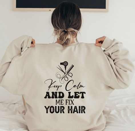 42.00 USD Hair Stylist Sweatshirts Hoodies Crewneck Hooded For Women Cosmetology Plus Size Hoodie Shirts Beautician Hairstylist Gifts for Her Introducing our Hair Stylist Sweatshirt - the perfect addition to any cosmetologist or hairstylist's wardrobe! This comfortable and stylish sweatshirt features a fun and playful message on the back that reads "Keep Calm and Let Me Cut Your Hair." Crafted with high-quality materials, this sweatshirt is not only stylish but also comfortable to wear. The… Hair Message, Hairstylist Gifts, Plus Size Hoodie, Funny Gifts For Him, Work Hairstyles, Cozy Fabric, Cosmetology, Boys Shirts, Family Shirts