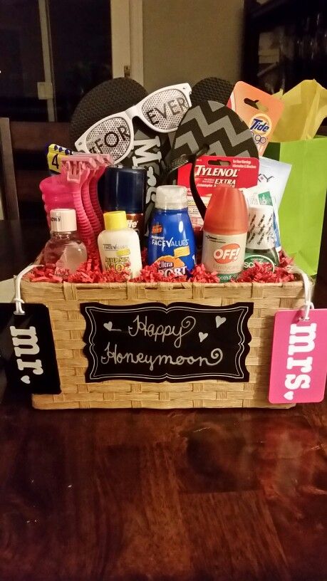 Honeymoon gift basket                                                                                                                                                                                 More Honeymoon Basket Ideas, Honeymoon Gift Basket Ideas, Wedding Night Gift Basket Couple, Bride And Groom Wedding Night Gift Basket, Wedding Night Gift Basket, Beach Honeymoon Gift Basket, Honeymoon Baskets For Bride And Groom, Honeymoon Gift Ideas, Honeymoon Kit