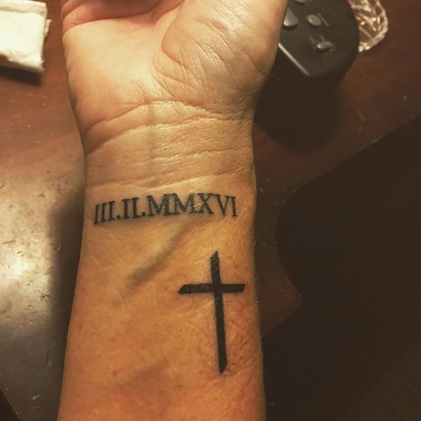 Roman numerals of the date I was saved accompanied by a simple cross Cross And Roman Numeral Tattoo, Tattoo Ideas Roman Numerals, Tattoo Ideas Roman, Memory Tattoo Ideas, Cross Tattoo Men, Memorial Tattoo Ideas, Roman Numeral Tattoos, Cross Tattoo For Men, Back Of Shoulder Tattoo