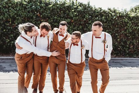 Boho Groom And Groomsmen Attire, Groomsmen Attire Copper, Groomsmen Attire Burnt Orange, Fall Wedding Groomsmen Attire Burnt Orange, Burnt Orange Groomsmen, Groomsmen Attire Brown Pants, Groomsmen Vest Rust, Rustic Orange Groomsmen Attire, Groom Fall Wedding Attire