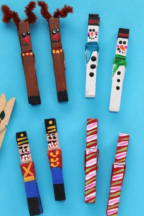 These painted clothespin Christmas ornaments are easy to make with just wooden clothespins and paint. They clip right to your Christmas tree, an evergreen garland or a string of Christmas lights. Make our reindeer, snowmen, candy canes and nutcrackers, or use your imagination to come up some creative ideas of your own. #HappyHooligans #HomemadeOrnament #Christmas #Craft #Kids #Art #Clothespin #Snowman #Reindeer #CandyCane #NutCracker Crafts #Tweens #Teens Reindeer Closepin Craft, Clothpin Crafts Christmas, Snowman Clothespin Ornaments, Christmas Clothespins Crafts, Clothes Pin Reindeer Crafts, Clothes Pin Reindeer Ornament, Clothes Peg Christmas Crafts, Craft With Clothes Pins, Clothes Pin Crafts For Adults Diy