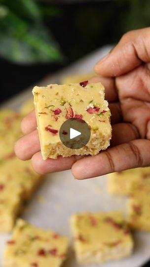 142K views · 6K reactions | 7 cup barfi Make this easy traditional South Indian sweet dish— 7 cup cake/7 cup burfi— for your family this Raksha Bandhan. Ingredients: You can use any cup or katori as your cup measure. We have used the standard 1/2 cup measure (100ml). 1 cup Besan 1 cup Milk 2 cups Sugar 1 cup Melted ghee 1 cup cashew powder (can use almond powder also) 1 cup grated coconut (can use dessicated coconut also) 1/2 tsp Cardamom powder Garnish: Rose petals, chopped pistachios Method: 1. Grease a tray with ghee and add rose petals and chopped pistachios at the bottom. 2. Heat ghee in a pan and add the besan. Roast it on low flame for 4-5 mins until the raw smell goes away and till it’s fragrant. 3. Add the rest of the ingredients and cook while mixing continuously on medi Dessicated Coconut, Almond Powder, Sweet Dish, Indian Sweet, Cardamom Powder, Grated Coconut, Raksha Bandhan, Ghee, 2 Cups