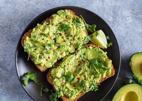 Avocado toast is a solid breakfast choice not just because it's delicious, but also because it takes no time to prepare. Throw a fried egg on top for some protein. Get the recipe here. 5 Minute Snacks, Eclair Recipe, Avocado Toast Recipe, Avocado Breakfast, Stuffed Avocado Healthy, Breakfast Snacks, Toast Recipes, Quick Snacks, Healthy Ingredient