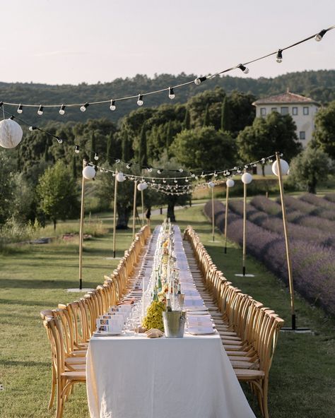 Marjorie + Joey | june 2024 | the longest dinner table set up ever at @lesdomainesdepatras • when I met @marjorie.artieres , creative director of @pinchfooddesign in nyc , I understood from the first mail that we would get along perfectly 🫶🏻 from the cocktails , the giant dessert made of Baba au rhum , the bread hanging from lamps , to the 50 meters long table to feed their 150 guests , very Provence , so colorful , it was the coolest to share the creative process with her - Joey , Marjorie ,... One Long Wedding Table, One Long Wedding Dinner Table, Long Dinner Table Wedding, Wedding Dinner Long Table, Long Table Dinner Party Outdoor, Outdoor Long Table Dinner, Italian Long Table Dinner, Long Island Vineyard Wedding, Dinner Table Set Up