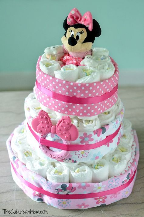 Disney Diaper Cake, Diaper Cake Ideas, Minnie Baby Shower, Diaper Cakes Tutorial, Diaper Cake Instructions, Minnie Mouse Baby Shower, Nappy Cake, Disney Baby Shower, Baby Shower Diaper Cake