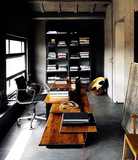 Black walls contrasted with good lighting in your men's office with exposed cement ceilings and floors make for sophisticated and elegant design for the bold man. | 10 Man Cave Ideas For Real Men https://diyprojects.com/man-cave-ideas-for-real-men/ Small Home Office Ideas For Men, Dark Home Office, Masculine Home Offices, Mens Home Office, Men Home Office, Masculine Home Office, Home Office For Man, Masculine Interior, Black Leather Chair