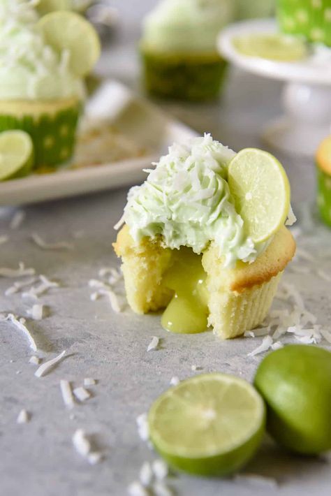 These Coconut Lime Cupcakes are the sweet-tart springtime treats of your dreams, and perfect for lovers of the tropics! Fluffy coconut-infused cupcakes are stuffed with tangy key lime curd, then topped with a crown of lime cream cheese buttercream and a sprinkle of flaked coconut. Key Lime Cupcakes, Infused Cupcakes, Lime Curd, Lime Cupcakes, Template Blogger, Southern Living Recipes, Lime Cream, Coconut Cupcakes, Coconut Desserts