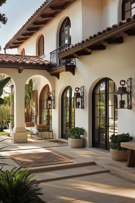 Uncover the grandeur of Mediterranean architecture with its rich cultural roots in Spain, Italy, and Greece, and its iconic design elements that have stood the test of time. 🏛️🌍 Mediterranean Houses Aesthetic, Italian Style Front Porch, Small Mediteranian House, Spanish Style Entryway, Spanish Architecture Hacienda Style, Greece Style Home, Mediterranean Architecture Modern, Houses In Spain, Modern Mediterranean Architecture