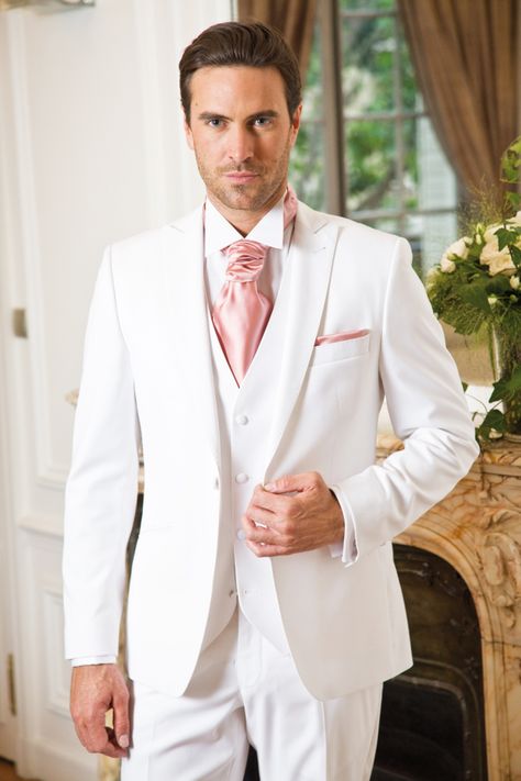 Look at this handsome hunk of groom with his pretty pink tie...yum! White Wedding Suits For Men, Groom Tuxedo Wedding, Tuxedo Wedding Suit, White Wedding Suit, Groomsmen Tuxedos, Groom Tuxedo, White Tuxedo, White Suit, Vest And Tie