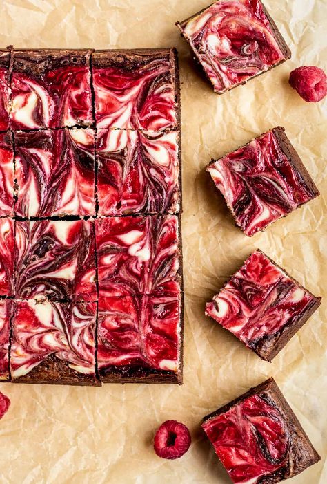 These raspberry cheesecake brownies are decadent, fudgy, creamy and fruity, all in one bite. Homemade raspberry jam and creamy, tangy cheesecake is swirled into rich and fudgy brownies, making these brownies truly irresistible. Raspberry Brownie Recipes, Blackberry Cheesecake Brownies, Summer Brownies, Raspberry Cheesecake Brownies, Boxed Brownie Recipes, Birthday Setup, Raspberry Swirl Cheesecake, Homemade Raspberry Jam, Cheesecake Brownies Recipe