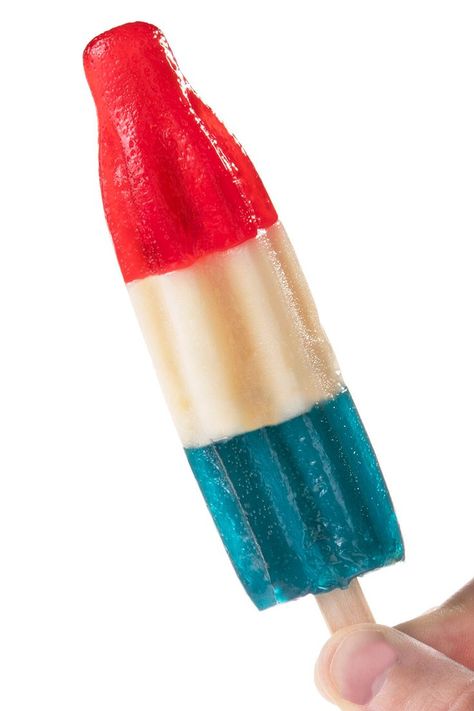 These gummy treats recreate the red (cherry), white (berry blast), and blue (blue raspberry) flavors on a popsicle stick of similar iconic frozen popsicles. Cottage Bedroom Decor, Frozen Popsicles, Rocket Pop, Simple Birthday Decorations, Snack Treat, Red Raspberry, Popsicle Stick, Red Cherry, Fruit Smoothie Recipes