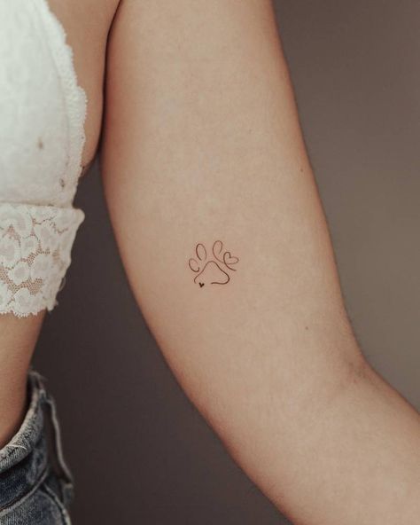 Minimalistic dog paw tattoo located on the inner arm. Dog Paw Tattoos, Paw Print Tattoos, Paw Tattoos, Small Dog Tattoos, Dog Tattoo Ideas, Inner Arm Tattoos, Tattoos For Dog Lovers, Pawprint Tattoo, Dog Paw Tattoo