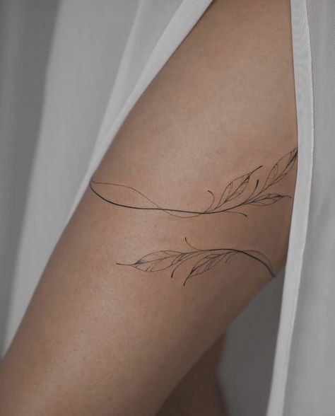 Thigh Tattoos Ideas For Women, Minimalist Thigh Tattoo, Dainty Shoulder Tattoos For Women, Fine Line Vine Tattoo, Botany Tattoo, White Tattoo On Dark Skin, Thigh Wrap Around Tattoo, Wrap Around Tattoo, Floral Thigh Tattoos