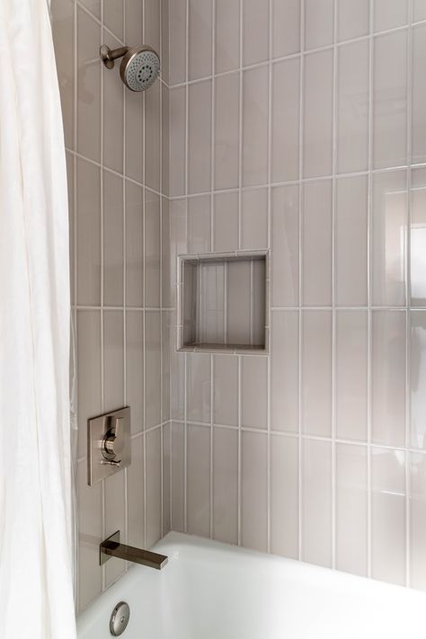 Long Vertical Tiles Bathroom, Big Vertical Shower Tile, Tub Tile Surround Ideas Bathroom, Vertical Straight Stack Shower Tile, 3x9 Subway Tile Bathroom, Verticle Tile Showers, Niche In Tub Shower Combo, Large Tile Tub Surround, Tile Around Tub Surround