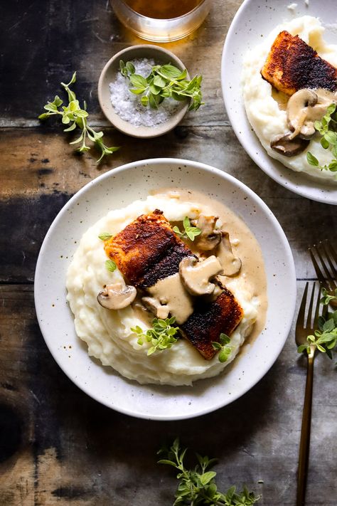 Simple, supple, and stylish, this blackened salmon is smothered in a brandy-infused mushroom cream sauce. Irresistible over mashed potatoes or polenta - make this to impress all of your fish-loving family and friends over Christmas! Salmon And Mashed Potatoes Dinners, Salmon And Mashed Potatoes, Diane Sauce, Mushroom Cream Sauce, Over Mashed Potatoes, Mushroom Cream Sauces, Blackened Salmon, Crimini Mushrooms, Potato Dinner