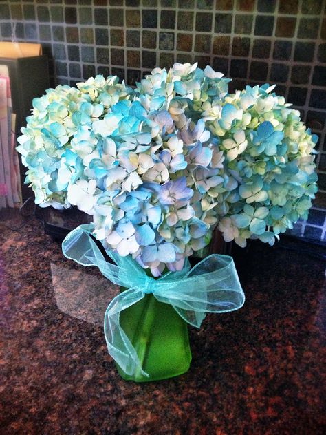 Light blue & white hydrangeas spray painted a Tiffany blue/robin's egg blue (teal) color to match the decor. From Floral Creations Florist. $16. Teal Hydrangea, Hydrangea Bouquets, Blue Hydrangea Bouquet, Tiffany Color, Floral Creations, White Hydrangeas, Sea Birthday Party, Robin's Egg Blue, Sea Birthday