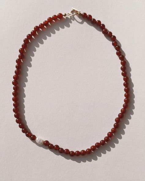 Lakshmi ❤️ Ruby red carnelian and one freshwater pearl ~ part of the asymmetric drop <3 #carnelian #beadedjewellery #beadnecklace #handmadejewellery Red Beaded Necklaces, Tan Leather Belt, Beads Making, Hindu Goddess, Red Carnelian, The Hindu, Red Necklace, Vibrant Energy, Handcrafted Accessories