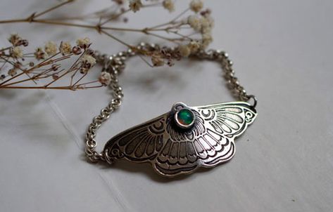 Moon butterfly is a beautiful sterling silver bracelet showing a big stylized and engraved moth bezel set with an opal cabochon with fire colors. Butterflies are a symbol of change and metamorphosis. #bracelet #butterfly #moth #opal #opalbracelet #animalbracelet #butterflybracelet #insect #engravedbracelet #animal #moon #night #astronomy #encouragement #motivation Moth Jewelry, Symbol Of Change, Moon Butterfly, Bracelet Butterfly, Animal Bracelet, Moon Night, Butterfly Bracelet, Engraved Bracelet, Opal Bracelet