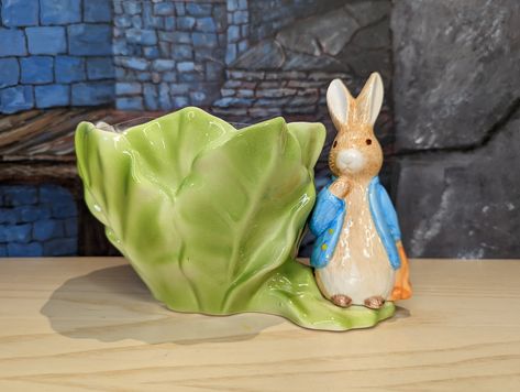 🐕 Big deals! Vtg 1998 Beatrix Potter Rabbit Ceramic Easter Planter Flower Pot Teleflora Spring Decor only at $25.0 Hurry. #ChildsRoomDecor #TelefloraGifts #EasterGift #PeterRabbit #easter #planter #Rabbit #EasterBunny #BeatrixPotter #Philippines Rabbit Standing, Peter Rabbit Characters, Cabbage Bowl, Flower Pot Ceramic, Easter Garden, Vintage Bowls, Green Ceramics, Paint Chips, Ceramic Dishes