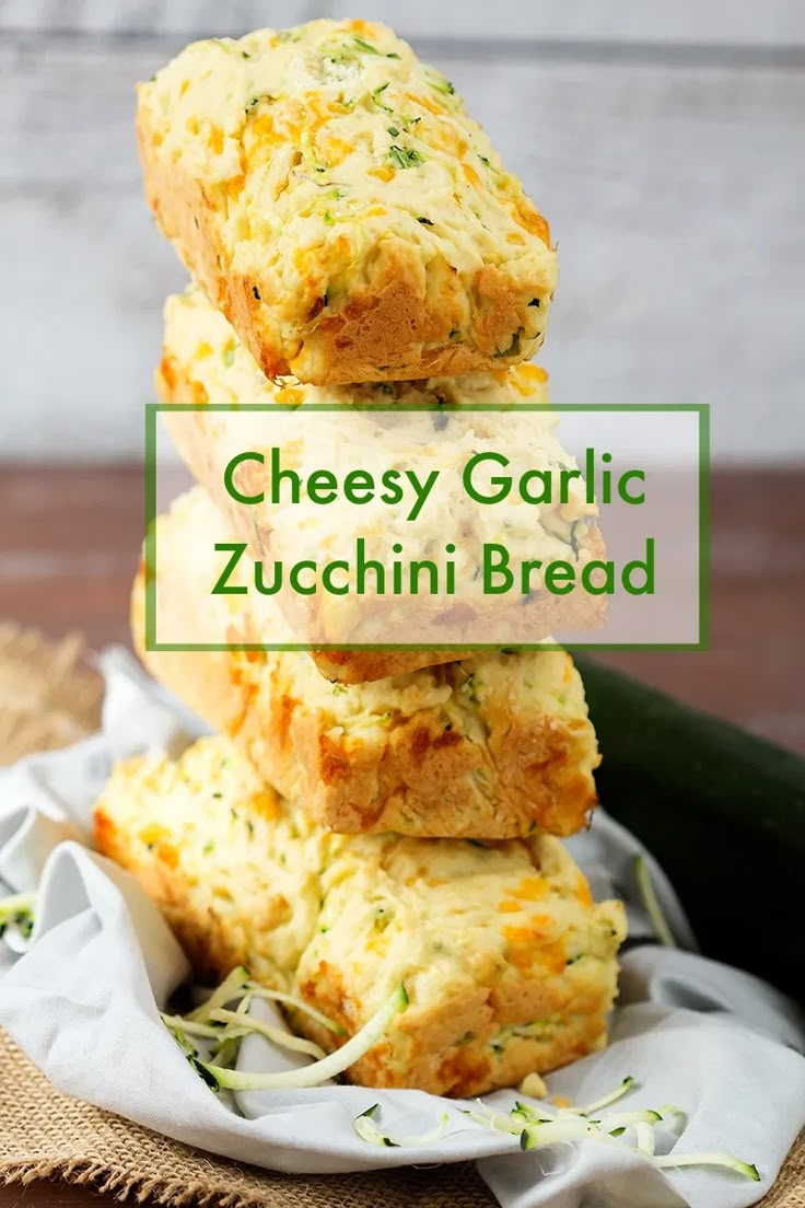 cheesy garlic zucchini bread stacked on top of each other