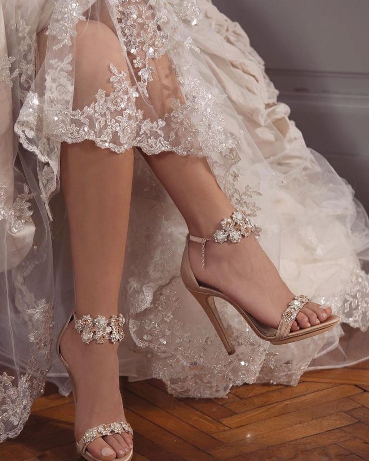 a woman wearing high heels and a wedding dress