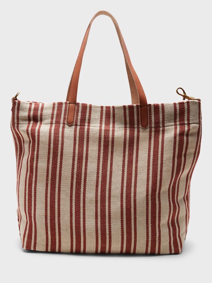 A sturdy canvas tote made to carry the essentials and then some.  Leather handles.  Hanging slip pocket inside.  Fully lined.  Height: 16" (41cm) Width: 13. 4" (34cm) Depth: 4. 75" (12cm) Texas Canvas, 37th Birthday, Large Tote Purse, Project Bags, Cowhide Bag, Large Leather Tote Bag, Knitting Project Bag, Grey Bag, Large Leather Tote