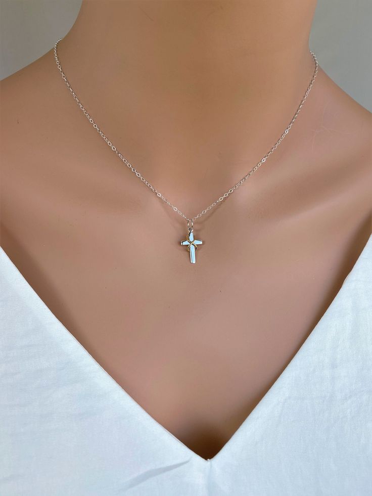 This sterling silver shiny cross charm features a bronze infinity link wrapped around the cross. The fusion of different color metals of this piece draws attention to the boundless faith of the wearer. This necklace is made of.... -22x10mm Silver Cross with Bronze Infinity on Crossbar and -Sterling silver cable chain with spring clasp, -Come up with beautiful ribbon gift box and -One set of Care instruction package. MORE CROSS JEWELRY https://www.etsy.com/shop/rainbowearring?search_query=CROSS M Silver Cross Necklace With Charms, Silver Cross Pendant Charm Necklaces, Cross Necklace With Charms As Gift, Silver Cross Pendant Charm Necklace, Silver Cross Charm Necklace For Spiritual Style, Silver Crucifix Charm Necklace For Gift, Spiritual Silver Cross Charm Necklaces, Personalized Silver Cross Charm Necklace, Spiritual Silver Cross Charm Necklace