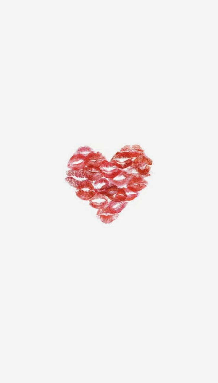 a red heart shaped object on a white background