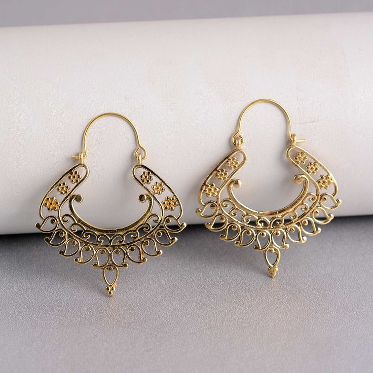 Mandala Brass Earrings - Small - Cute - Ethnic - Bohemian - Hippie - Filigree - Boho - Elegant - Indian - Pendientes - Plata - Moon - Luna Material:- Brass These earrings are lightweight and adjustable to fit any ear! We found this piece while traveling across the tribal deserts in India. Indian tribal jewelry is known for being unique, detailed, and of high quality. ♥We Crafted These in 100% Solid brass These Simple Earrings are perfect for any occasion. Then we lightly hammered and slightly po Bohemian Chandelier Earrings With Ear Wire For Festivals, Ornate Brass Earrings For Festival, Ornate Brass Festival Earrings, Bohemian Brass Danglers For Pierced Ears, Gold Earrings With Latkans For Summer, Bohemian Festive Plug Earrings With Latkans, Gold Bohemian Teardrop Plug Earrings, Gold Teardrop Bohemian Plug Earrings, Ornate Chandbali Earrings For Festival