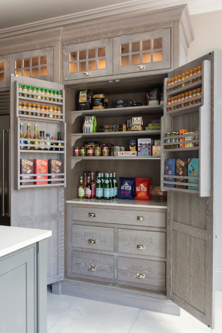 an organized pantry with lots of food and drinks