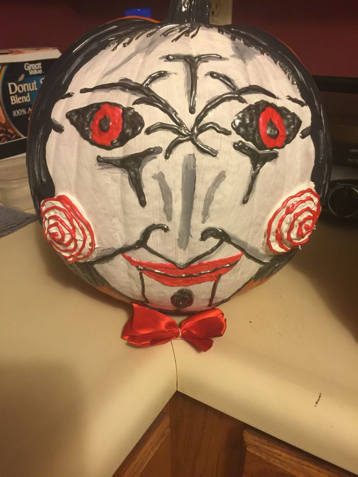 a paper mache that looks like it has red eyes