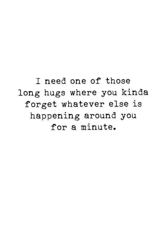 a black and white photo with the words i need one of those long hugs where you kinda forget whatever else is happening around you for a minute