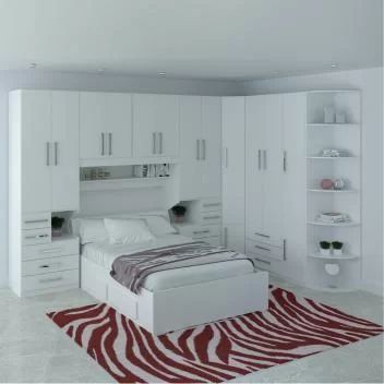 a bedroom with white cabinets and a zebra rug