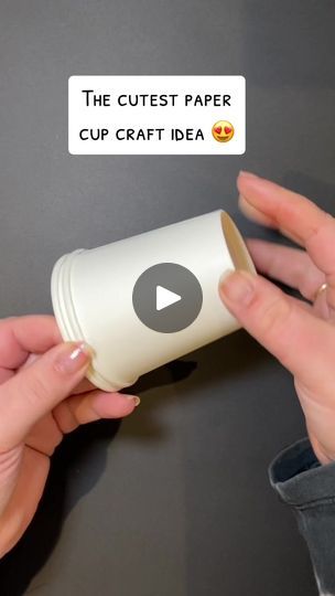 a woman holding a cup with the caption'the cutest paper cup craft idea '