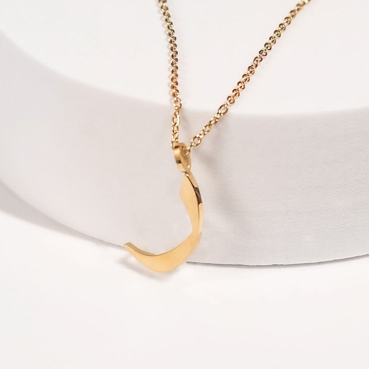 This stunning necklace features a beautifully crafted pendant with a personalized Arabic letter. The elegant design of the letter captures its unique and intricate beauty, making it a focal point of sophistication and charm. The pendant hangs from a delicate chain, perfect for adding a touch of elegance to any outfit. Ideal for everyday wear or special occasions, this necklace makes a meaningful and stylish statement. It also serves as a thoughtful and personalized gift for loved ones, celebrati Personalized Initial Pendant Necklace On Clavicle Chain, Elegant Personalized Oval Pendant Necklace, Formal Initial Pendant Necklace With Clavicle Chain, Delicate Initial Pendant Necklace For Formal Occasions, Elegant Initial Pendant Necklace For Formal Occasions, Elegant Initial Necklace With Clavicle Chain, Gift Name Necklace With Initial Pendant, Gift Name Necklace With Initial Pendant On Clavicle Chain, Elegant Initial Necklace With Heart Pendant And Delicate Chain