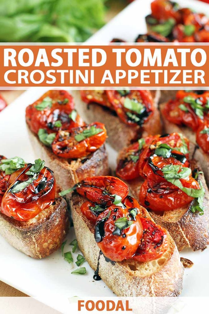 roasted tomato crostini appetizer on a white plate with text overlay