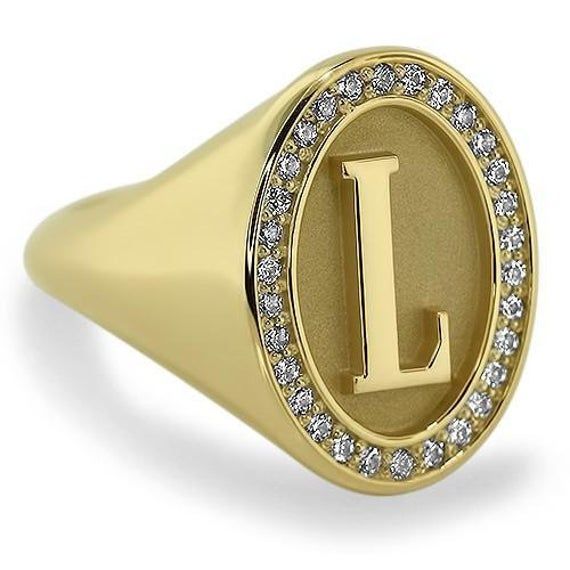 A Personalized Signet Ring, made on solid gold with the most sparkling diamonds ever! METAL COMPOSITION: 14k Gold or 18k Gold. ACCENT STONES: Trade Name: Diamonds Carat Weight: .30 Ct. of natural conflict free diamonds Color: F-G Clarity: VS2 Cut: Very Good to Excellent Hardness: 10 OUR PROMISE: -We stand by every piece we make, so we proudly offer 7-Day Returns. If you don't love it we'll take it back. -Every piece comes with a 365-Day Warranty -Earth-friendly, recycled precious metals. -Every Personalized Initial Ring, Ring Tattoos, Golden Ring, Make Your Own Jewelry, Jewelry Personalized, Initial Ring, I Love Jewelry, Personalized Initials, Gold Accent