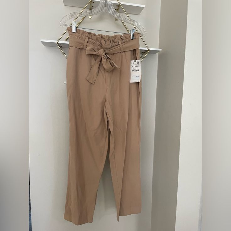 Women Trousers New With Tags. Beige Pants With Belt Loops For Day Out, Zara Belted Bottoms For Spring, Zara Summer Office Pants, Trendy Beige Belted Bottoms, Chic Summer Office Bottoms, Zara Paperbag Waist Bottoms For Summer, Beige Paperbag Waist Bottoms For Fall, Belted Bottoms For Office In Spring, Trendy Workwear Bottoms With Tie Waist