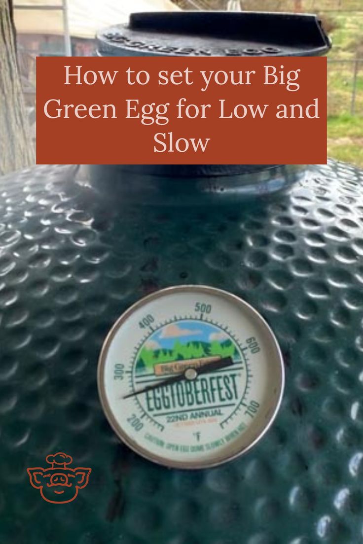 an egg sitting on top of a grill with the words how to set your big green egg for low and slow