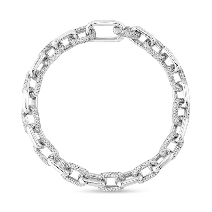 Style Number - AZ19104
This extremely unique 14k White Gold Paperclip Bracelet with diamond chained links is such a gorgeous statement piece to wear on your wrist. This piece showcases twenty-six paper clips linked together. The diamonds are of SI1-SI2 quality and G-H color and total 3.67ct.Mix and match with our other paperclip jewelry selections. Sapphire Bangle, White Gold Diamond Bracelet, Diamonds Bracelet, Pave Bracelet, Gold Link Bracelet, Gold Charm Bracelet, Diamond Chain, Star Bracelet, Bar Bracelets