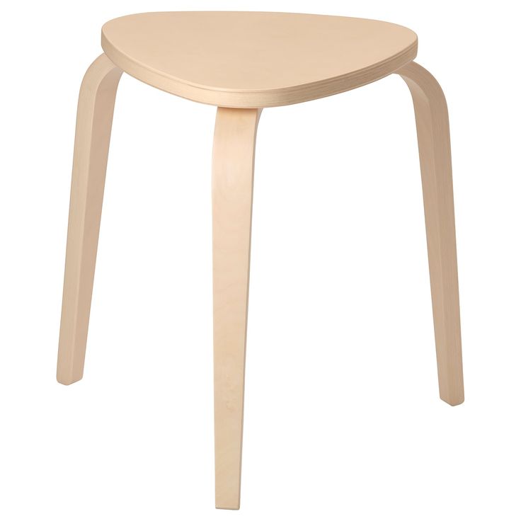 a small wooden stool with curved legs on an isolated white background for use as a side table