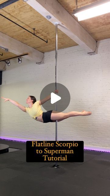 a woman is doing aerial acrobatics on a pole