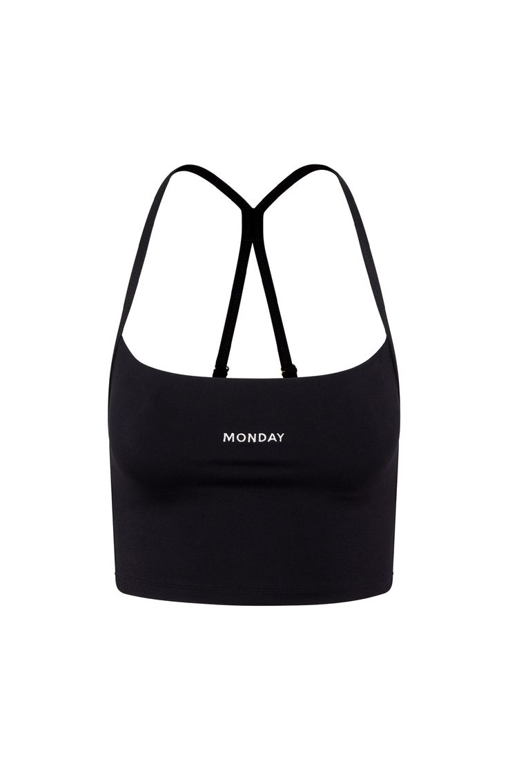 a black sports bra top with the word monday printed on it and two straps at the bottom