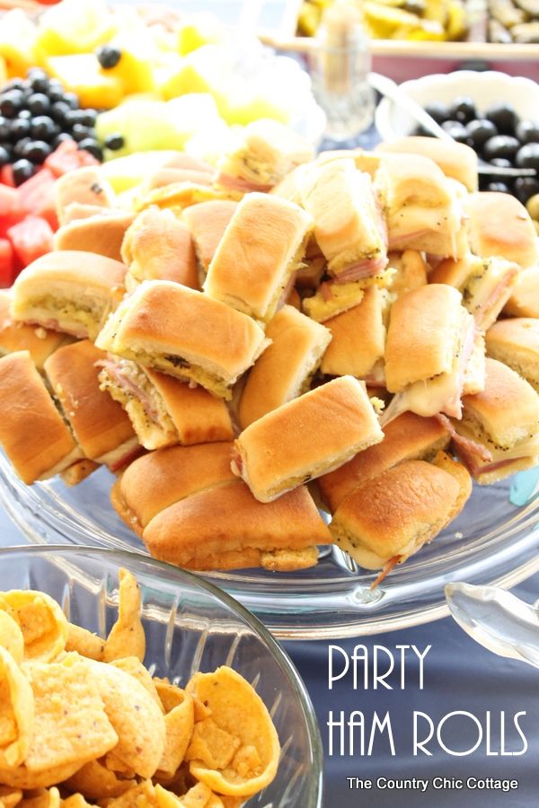 an image of party ham rolls with fruit in the background